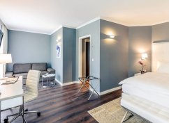 Romantický pokoj pro dva v hotelu Mercure Raphael Vídeň – dvojlůžko a moderní interiér